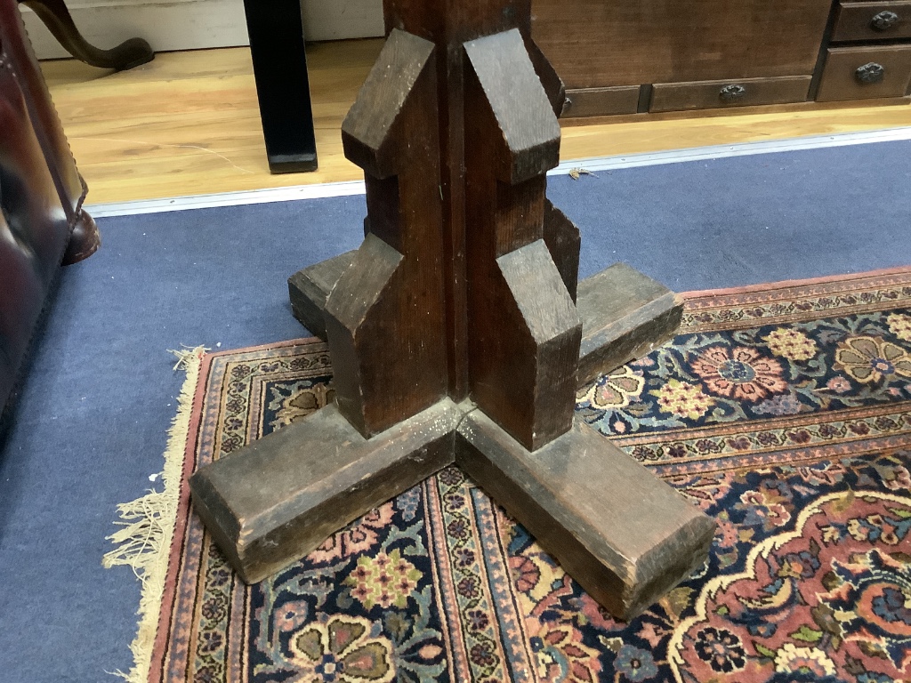 A Victorian pine Gothic style lectern, width 50cm height 139cm